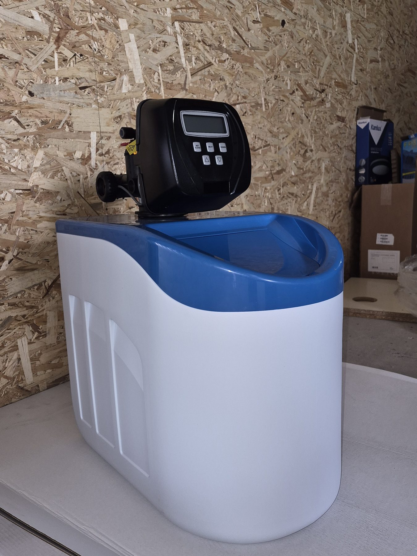 A modern water softener with a digital control valve installed by Keystone Water