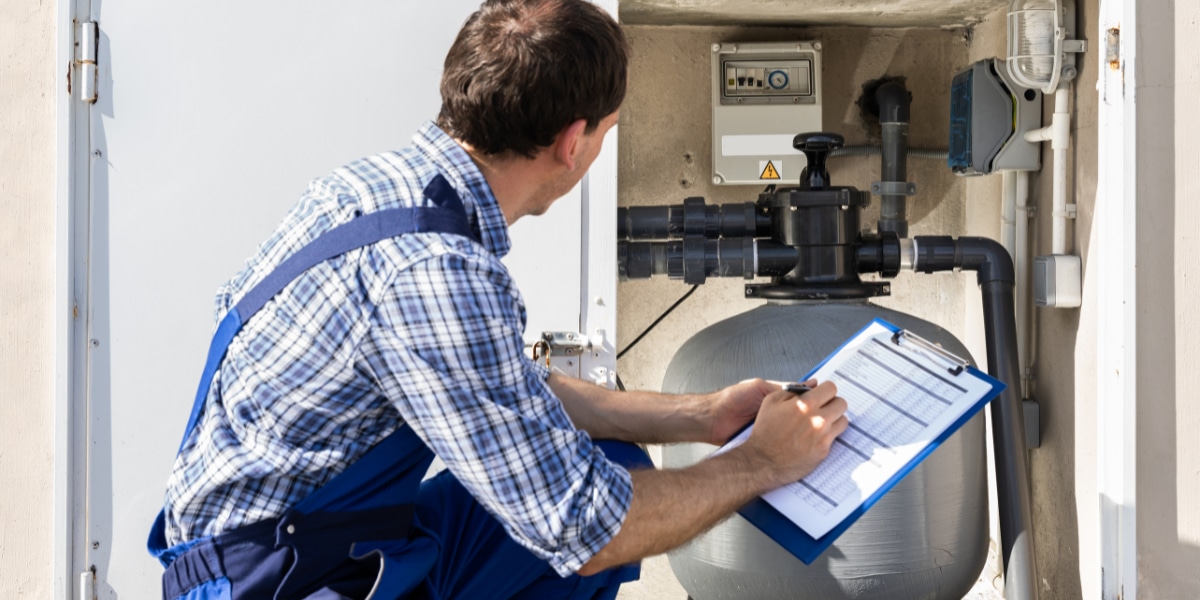 A Keystone Water specialist assessing a household water system